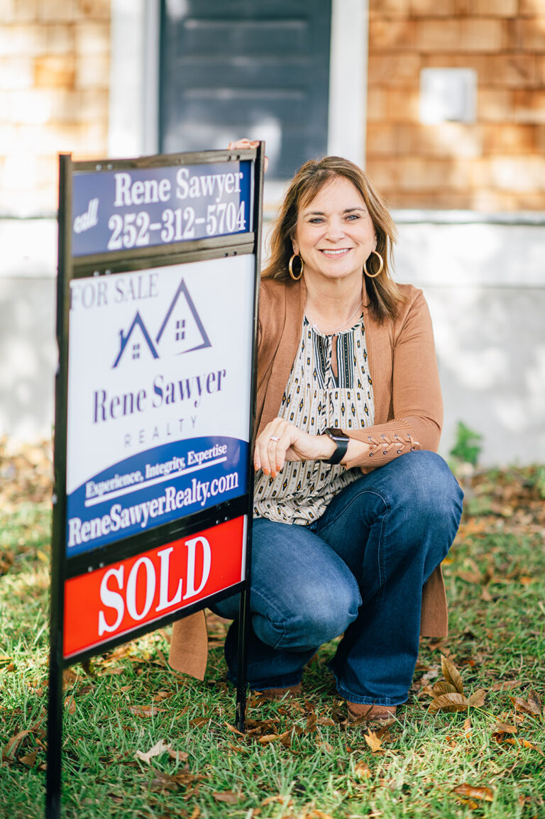 Rene Sawyer with sold sign